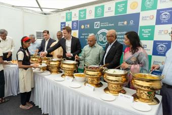 Ceremonial serving of mid-day meals to children