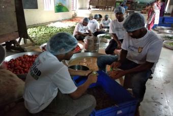 Vegetables being chopped are readied for the cooking process