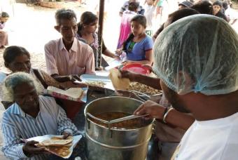 Akshaya Patra serves chapati, curry, and pulao