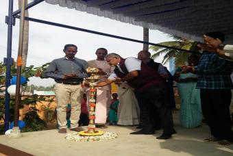 Mr NV Balachandar, President-HR, Communication and CSR, Ashok Leyland, lighting the lamp