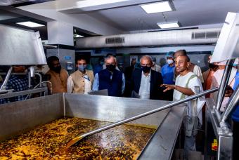 Guests take the tour of the kitchen to see its operations