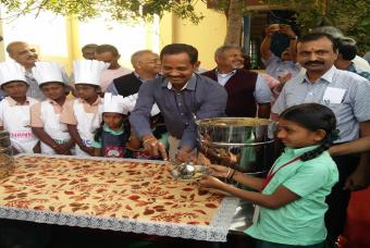 Dr S Prabhakar, District Collector, Krishnagiri, serving the children