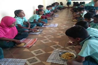 Children savour the nutritious breakfast 