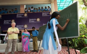 Children demonstrate their mathematical skill. Photo credit: Clinton Foundation/ Barbara Kinney